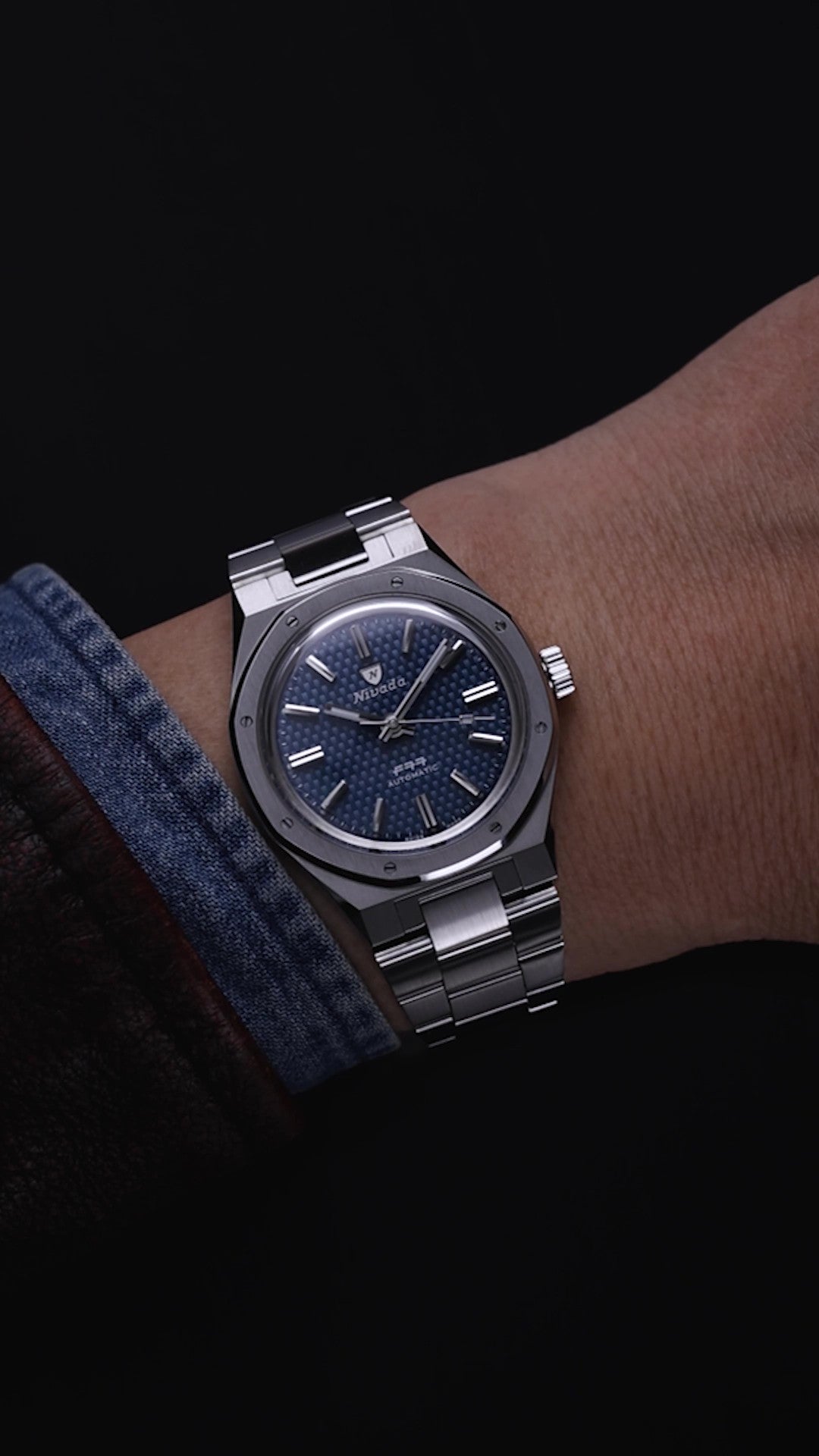 <iframe width="483" height="858" src="https://www.youtube.com/embed/8gr1tYFB1nc" title="NIVADA GRENCHEN - F77 Blue No-date Auto | 68001A77 wrist shot" frameborder="0" allow="accelerometer; autoplay; clipboard-write; encrypted-media; gyroscope; picture-in-picture; web-share" referrerpolicy="strict-origin-when-cross-origin" allowfullscreen></iframe>